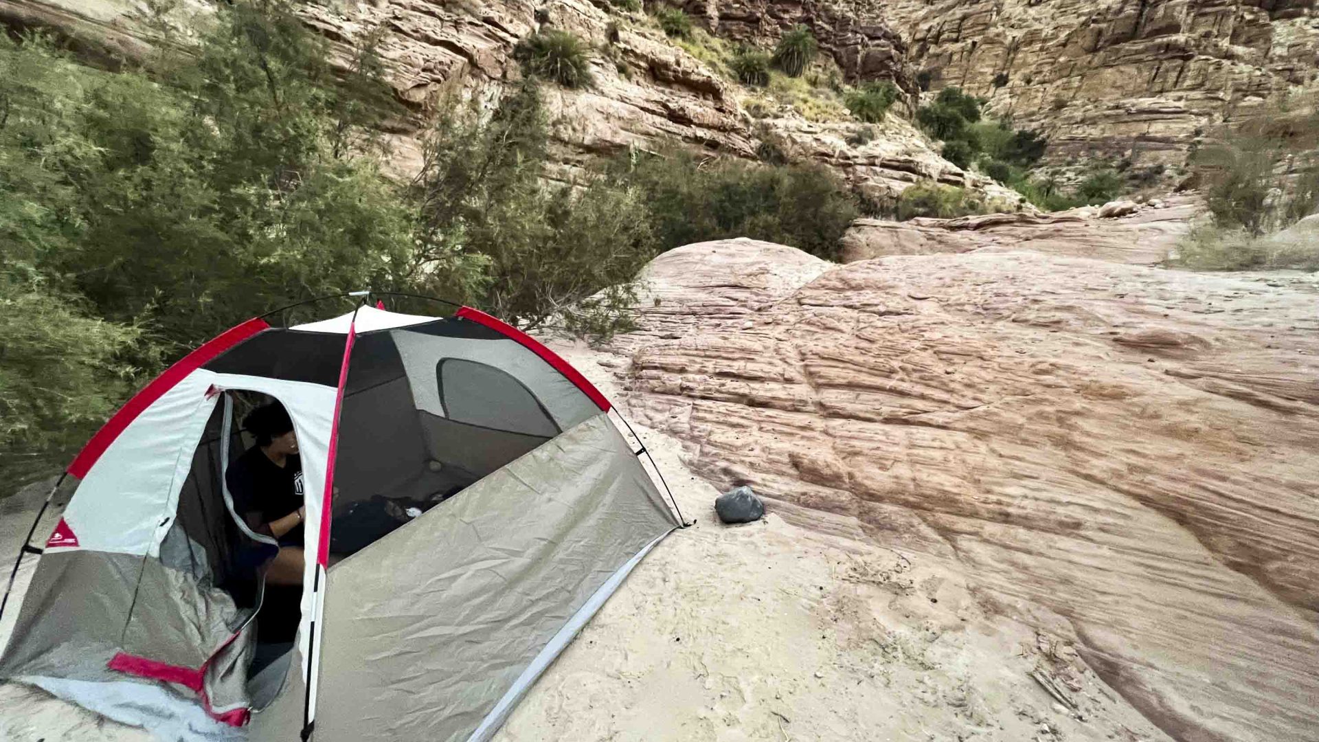 A tent pitched in the canyon.